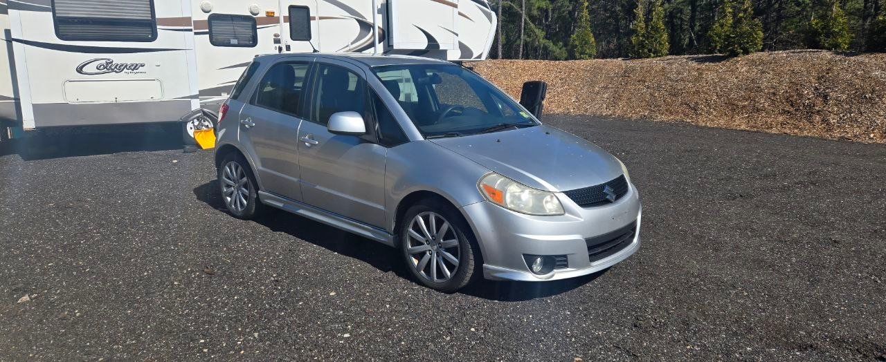 2011 Suzuki SX4 rental car for Uber and DoorDash drivers in New Jersey
